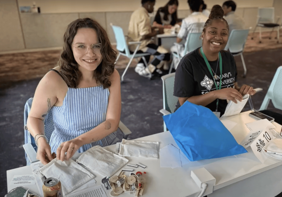 Interns at orientation doing a teambuilding give back