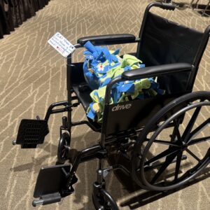 Wheelchair with blanket and message