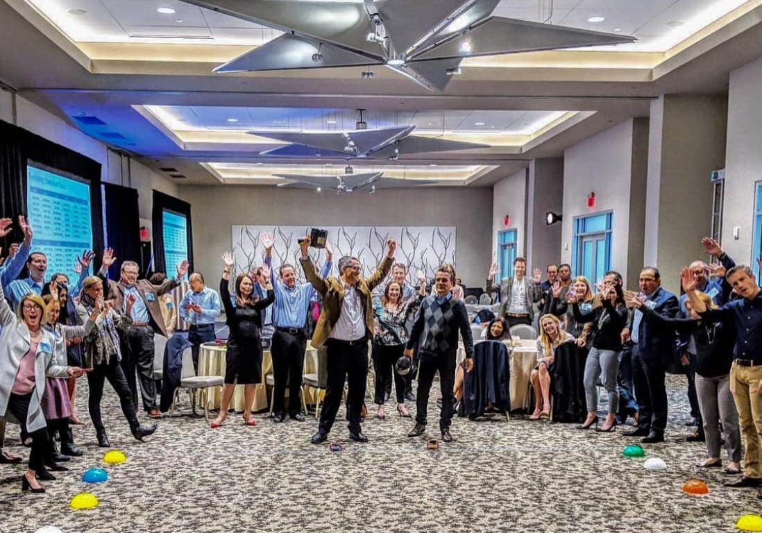 Large group having an event indoors